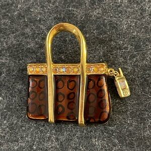 Vintage purse brooch marked TC